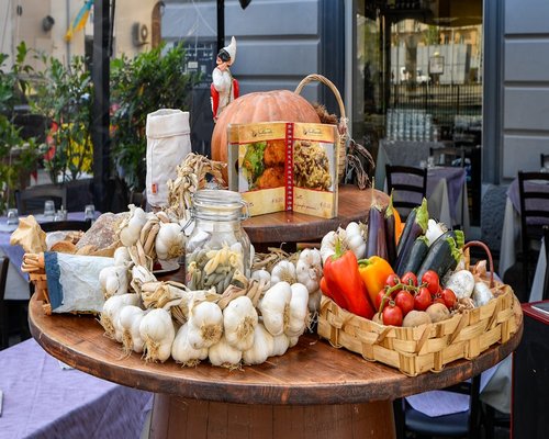 A diverse assortment of fresh local fruits and vegetables displayed beautifully on a table